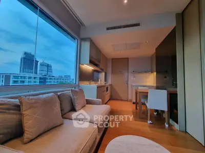 Modern living room with city view and stylish furniture