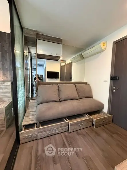 Modern compact living room with built-in storage and sleek design