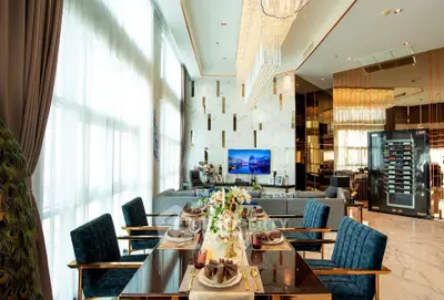 Luxurious living room with elegant dining area and modern decor