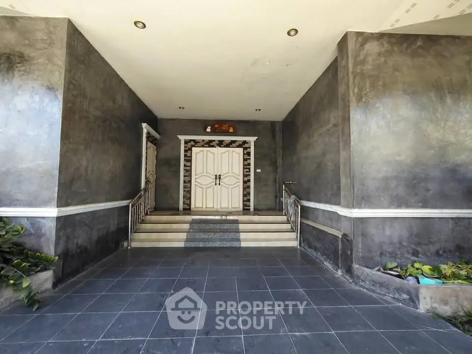 Elegant entrance with modern design and stylish double doors