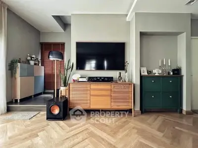 Stylish living room with modern decor and wooden flooring