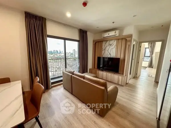 Modern living room with balcony view and stylish decor
