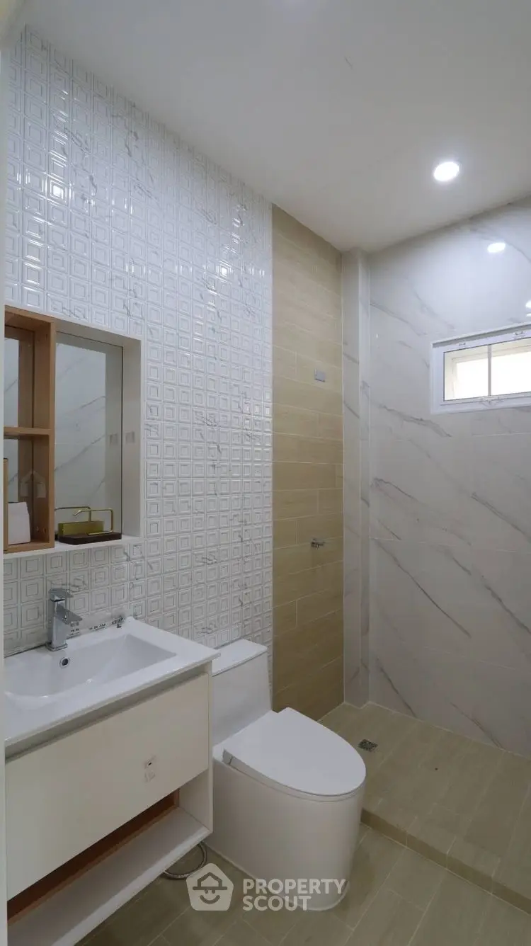 Modern bathroom with sleek design and elegant tile work