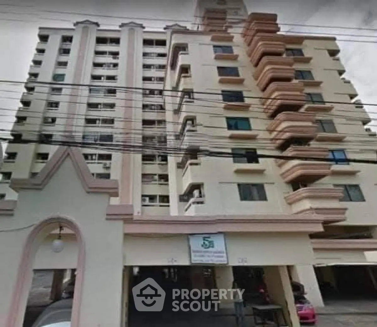 Stunning multi-story residential building with unique architectural design and ample balconies.