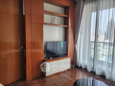 Elegant living room with wooden paneling and city view