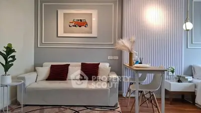 Stylish living room with modern decor and cozy dining area, perfect for urban living.