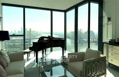 Luxurious living room with panoramic city views and elegant grand piano.