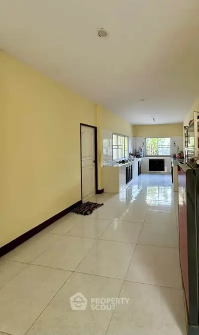 Spacious kitchen with open layout and modern appliances