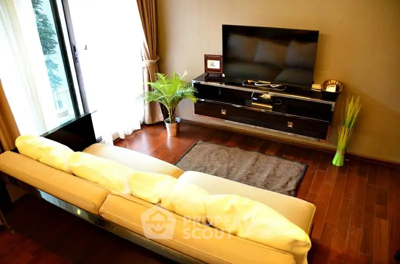 Stylish living room with modern TV setup and elegant decor
