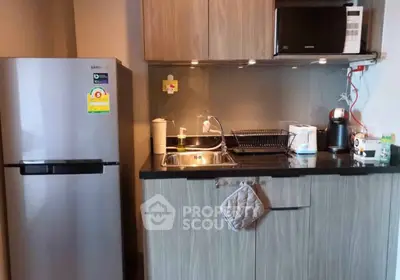 Modern kitchen with sleek appliances and stylish cabinetry