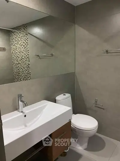Modern bathroom with sleek fixtures and stylish tile design