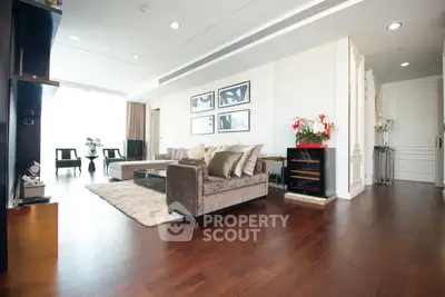 Luxurious living room with elegant decor and hardwood floors in modern apartment