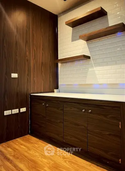 Modern kitchen with wooden cabinets and white subway tile backsplash