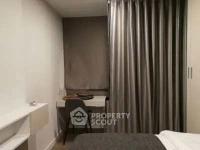 Cozy bedroom with study nook and modern decor