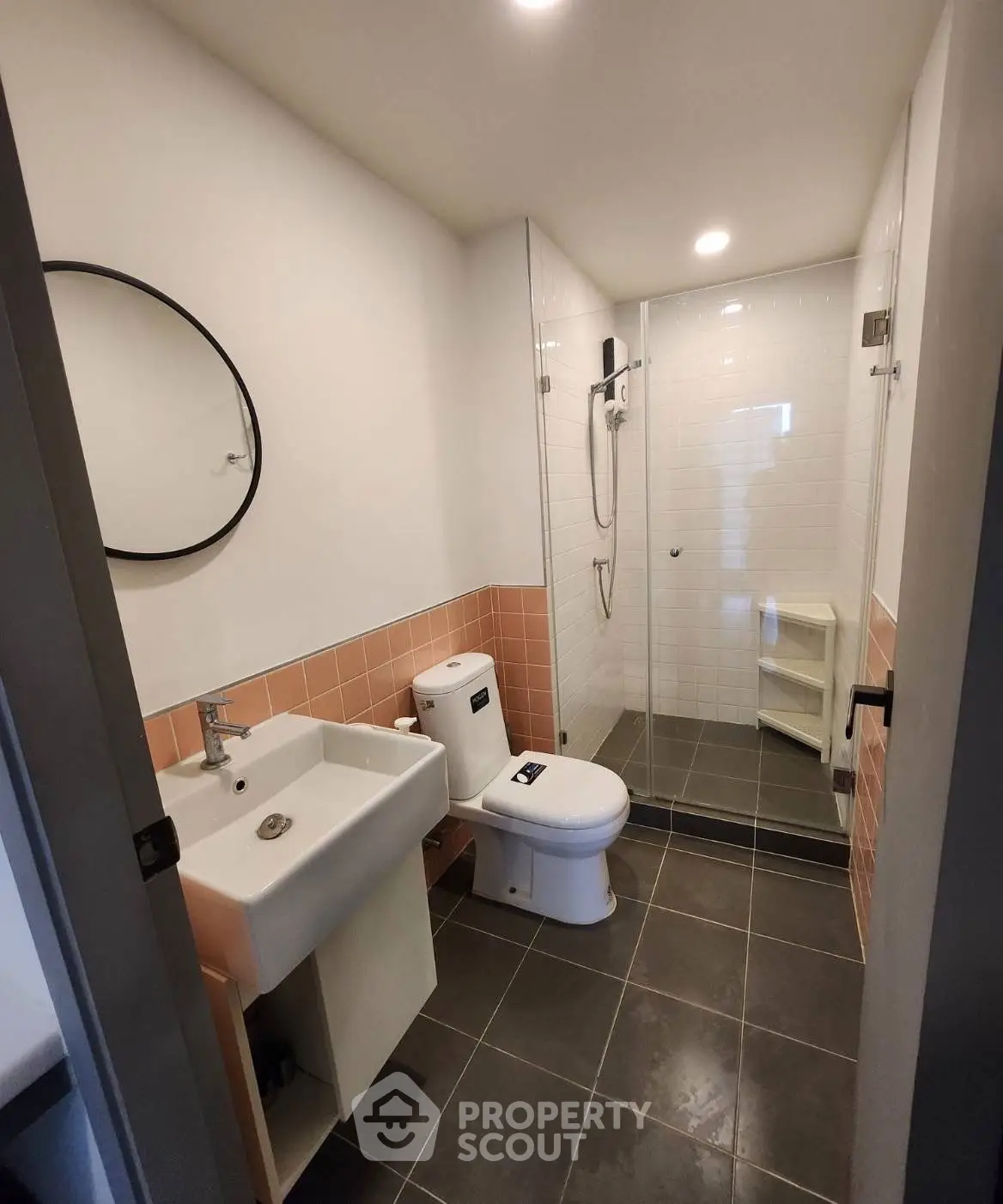 Modern bathroom with sleek design and glass shower enclosure