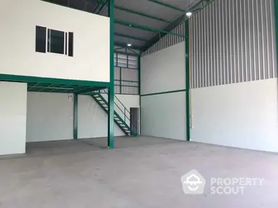 Spacious industrial warehouse with mezzanine and high ceilings