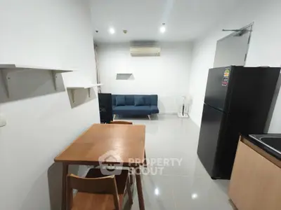 Modern apartment interior with dining area and cozy living space