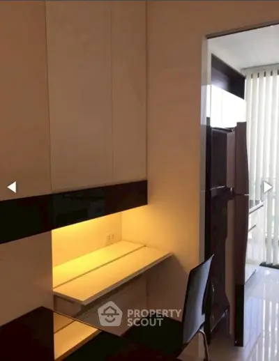 Modern study nook with built-in desk and chair, perfect for compact spaces.