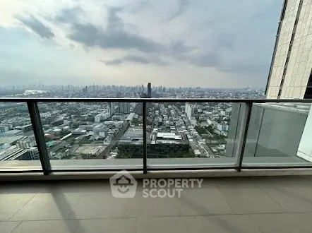 Stunning high-rise balcony with panoramic cityscape view, perfect for urban living enthusiasts.