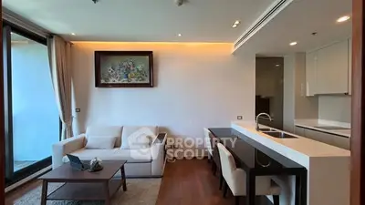 Modern living room with open kitchen and elegant decor