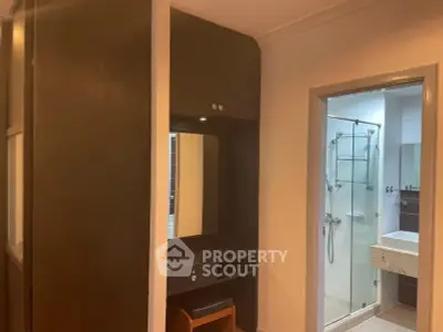 Modern apartment interior with stylish vanity and bathroom view