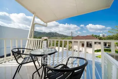 Charming balcony with stunning mountain views, perfect for relaxing outdoors.