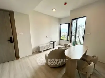 Modern living room with city view and stylish furniture in high-rise apartment
