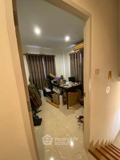 Cozy study room with ample natural light and modern decor