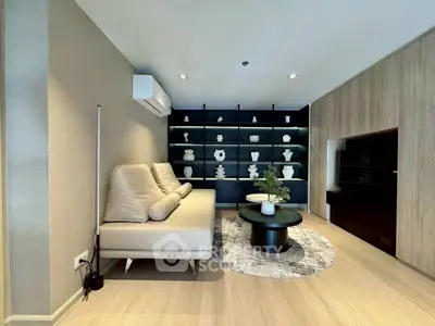 Modern living room with stylish decor and built-in shelving