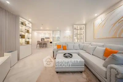 Luxurious modern living room with elegant decor and open kitchen layout