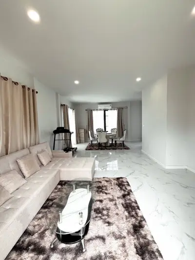 Spacious modern living room with elegant decor and natural light