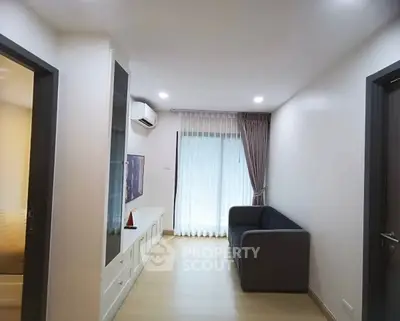 Modern living room with sleek furniture and natural light