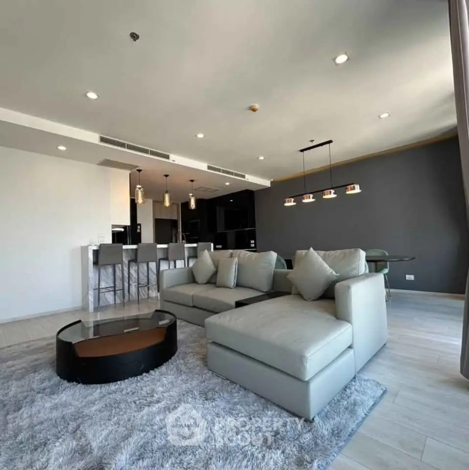Spacious modern living room with elegant decor and open layout