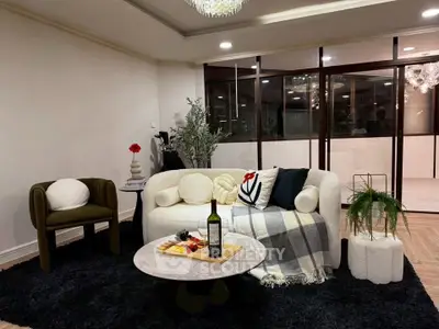 Elegant living room with modern decor and cozy seating area
