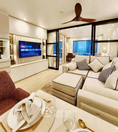 Luxurious modern living room with elegant decor and city view, featuring plush seating and stylish dining setup.