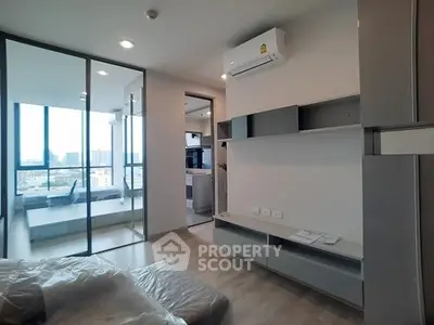 Modern apartment interior with air conditioning and city view