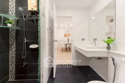 Modern bathroom with sleek design and spacious shower area