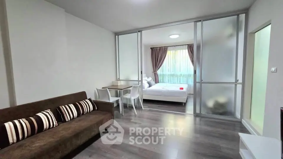 Modern studio apartment with open layout and stylish furnishings