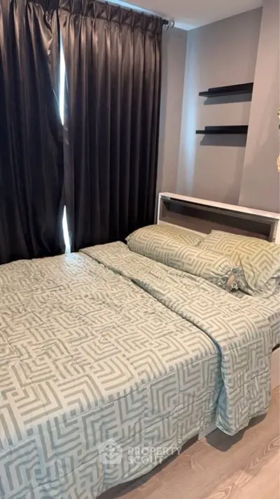 Cozy bedroom with stylish bedding and dark curtains, perfect for restful nights.