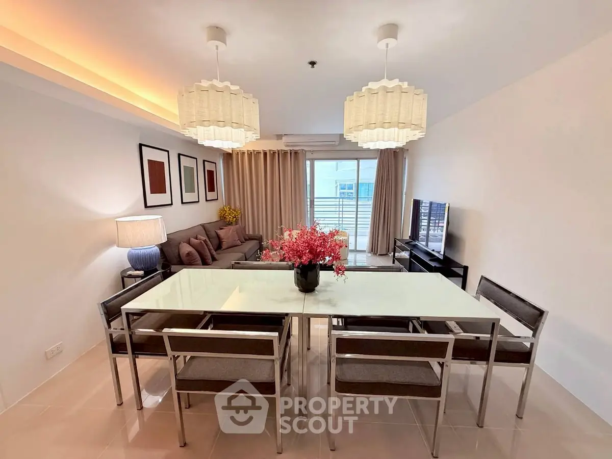 Modern living room with elegant dining area and stylish decor