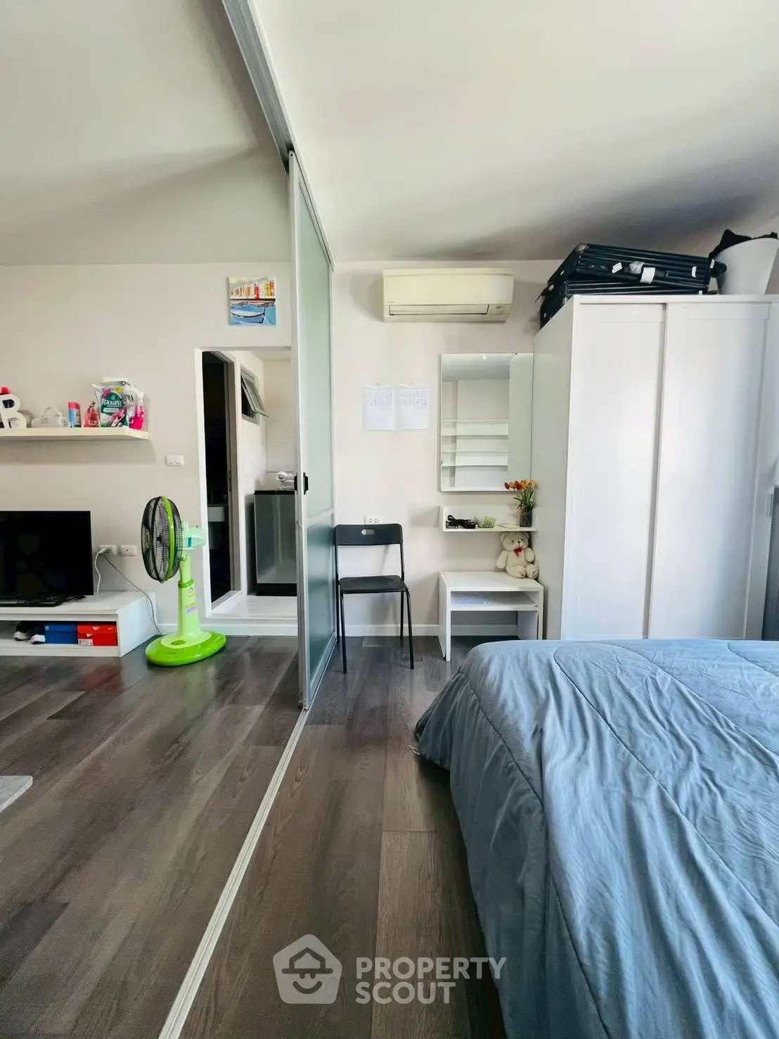 Modern bedroom with sleek design and ample storage space