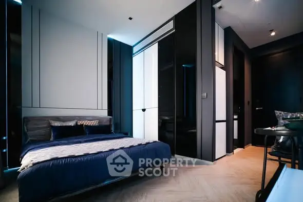 Modern bedroom with sleek design and ambient lighting