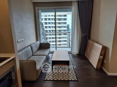 Modern living room with balcony view in urban apartment