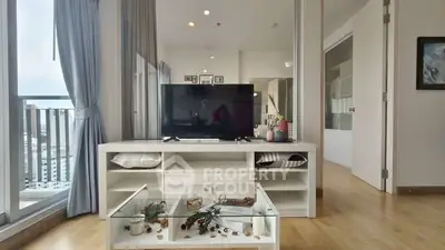 Modern living room with balcony view and stylish decor
