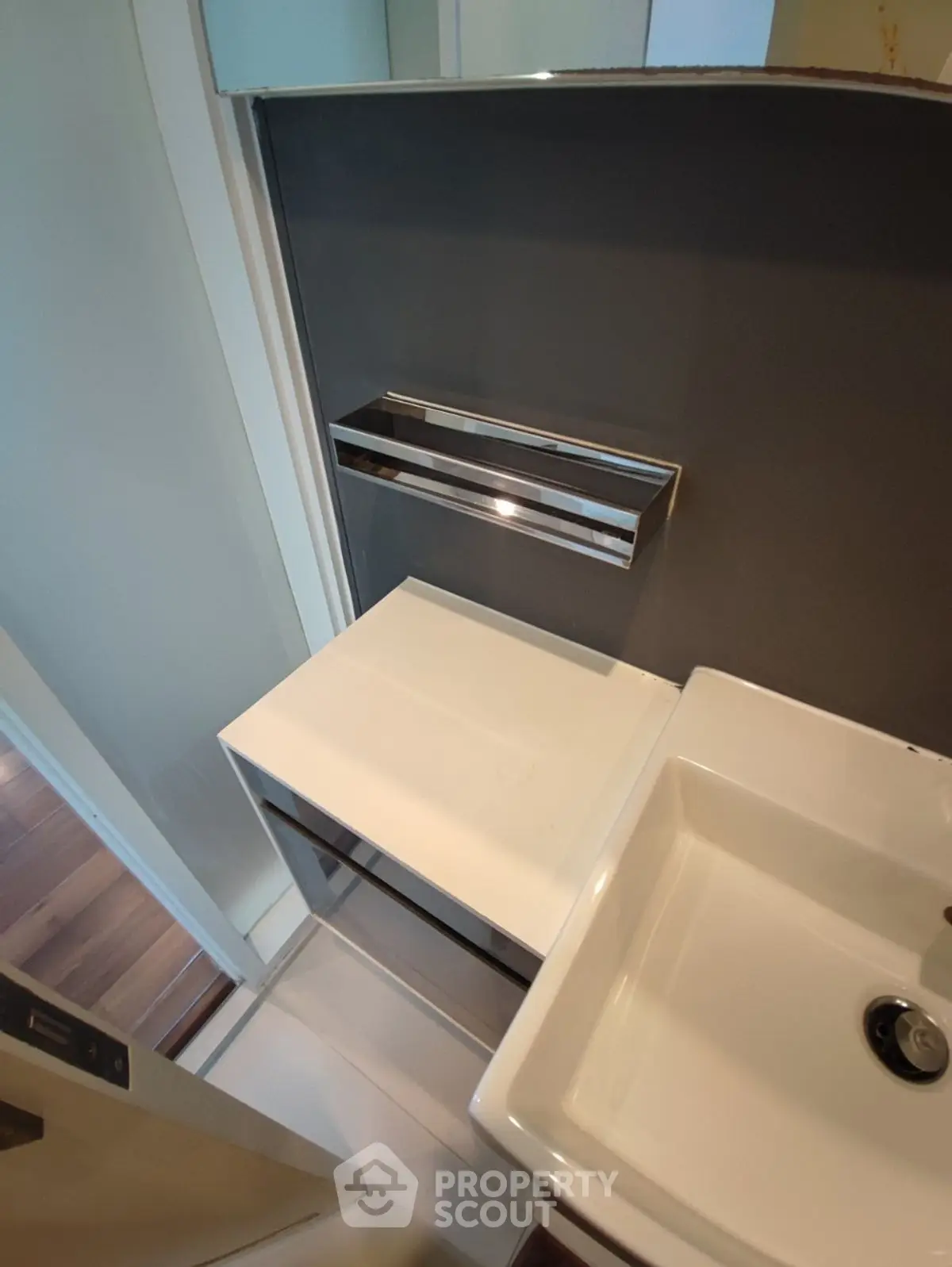 Modern compact bathroom with sleek fixtures and minimalist design