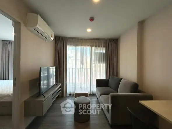 Modern living room with sleek furniture and natural light