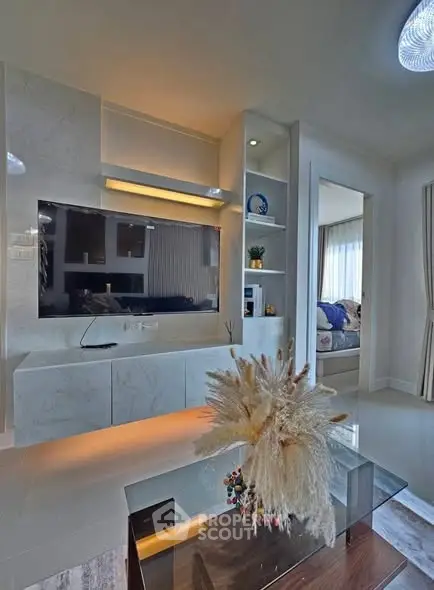 Modern living room with sleek TV unit and elegant decor