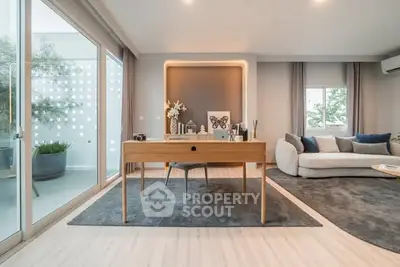 Modern living room with stylish furniture and natural light