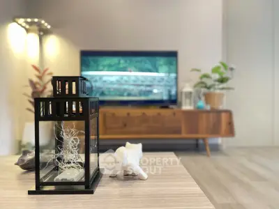 Stylish living room with modern decor and TV setup