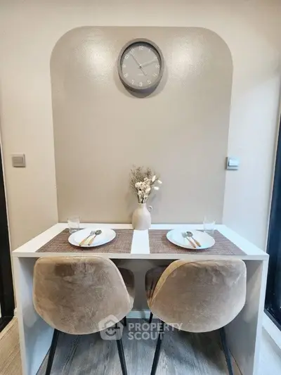 Cozy dining nook with modern decor and neutral tones